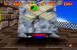 Mario is being squished by the Whomp