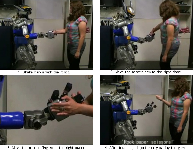 Image of the experiment - playing rock paper scissors with a humanoid robot